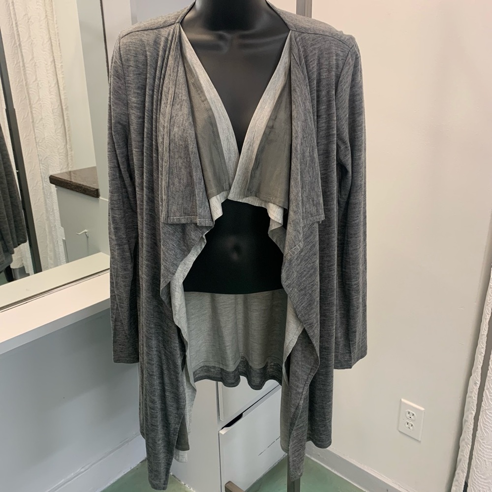 Miilla sweater in gray. Brand new with tags. Size medium and large available.
